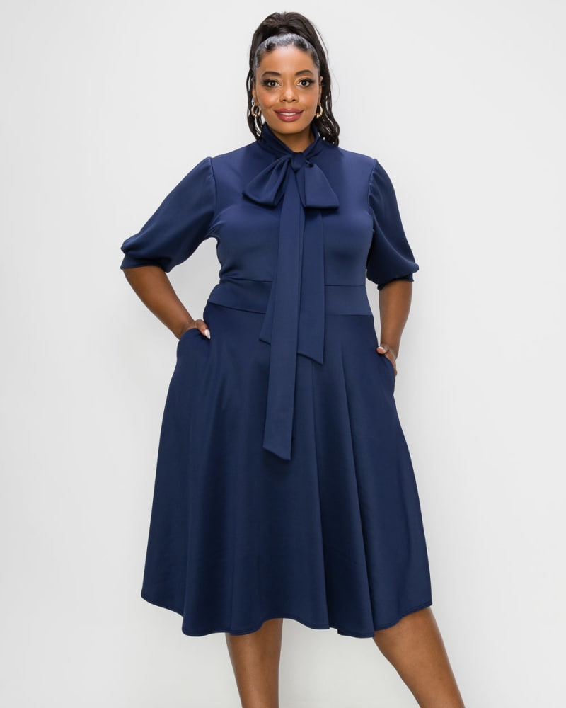 Front of a model wearing a size 1X Casey Scuba Flare Dress in Navy by L I V D. | dia_product_style_image_id:240636